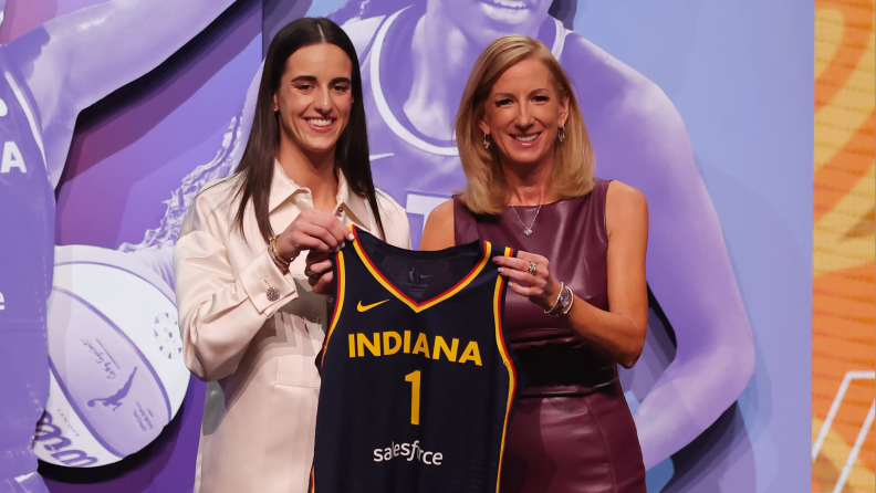 Caitlin Clark with WNBA Commissioner Cathy Engelbert after getting drafted first overall.