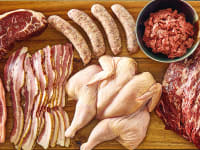 Crowd Cow box with chicken, ground beef, bacon, steaks, sausage