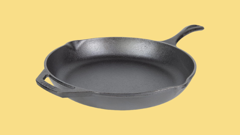 Cast iron skillet against yellow background