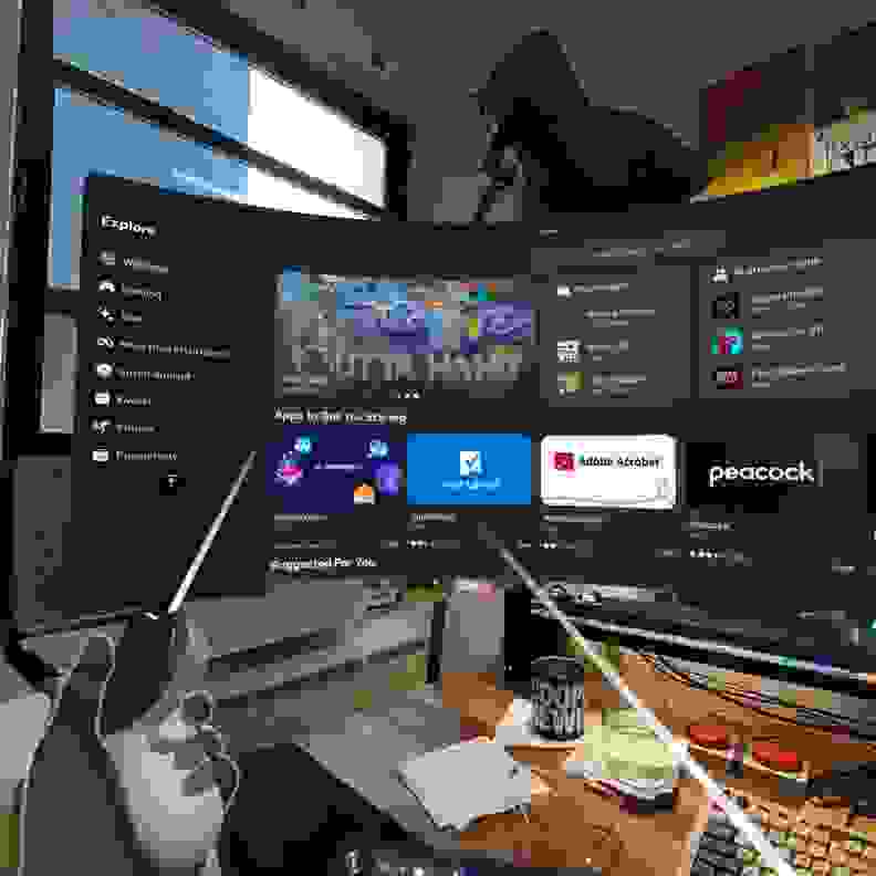 A floating VR display showing productivity apps