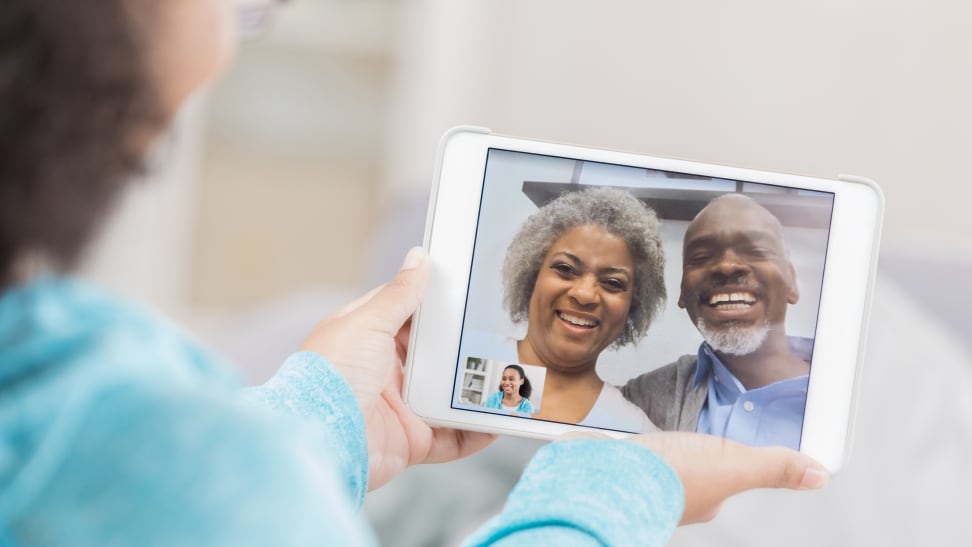 Girl video chatting with grandparents