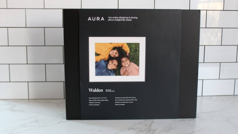 The Aura Walden digital photo frame in its packaging.