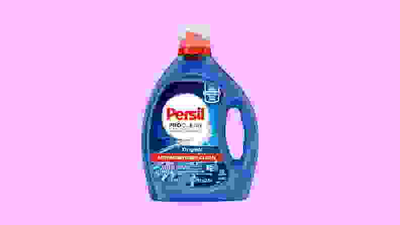 Blue containter of Persil ProClean laundry detergent on a purple background.