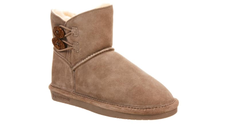 An image of a single camel-colored suede bootie.