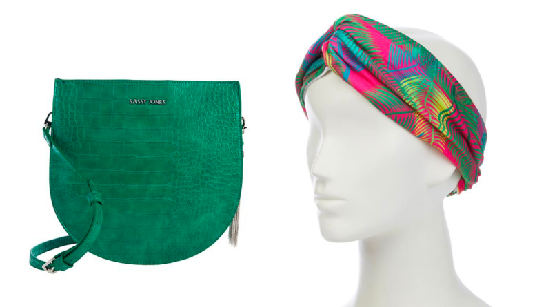 An image of a green purse alongside a colorful headwrap on a manequin.