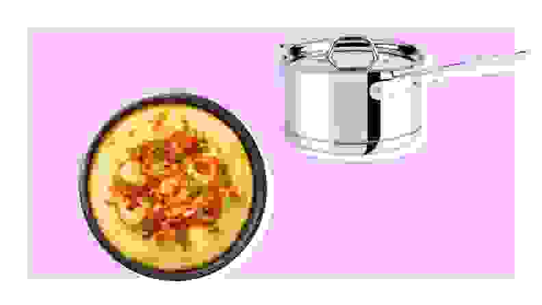 Dish of shrimp and grits and All-Clad sauce pan on purple background