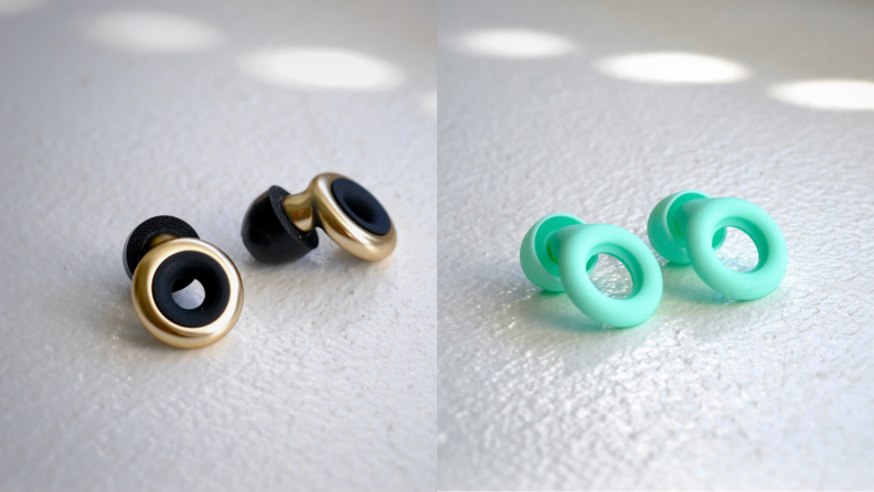Gold and black and mint green loop earplugs on white countertop.