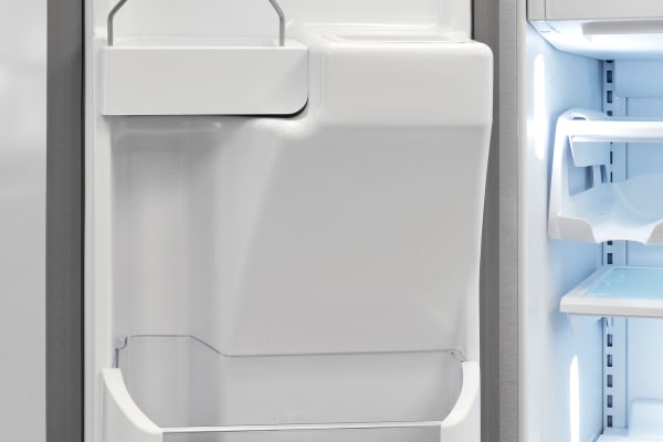 Left-hand shelves are shaped to accommodate the Frigidaire Professional FPBC2277RF's ice dispenser.