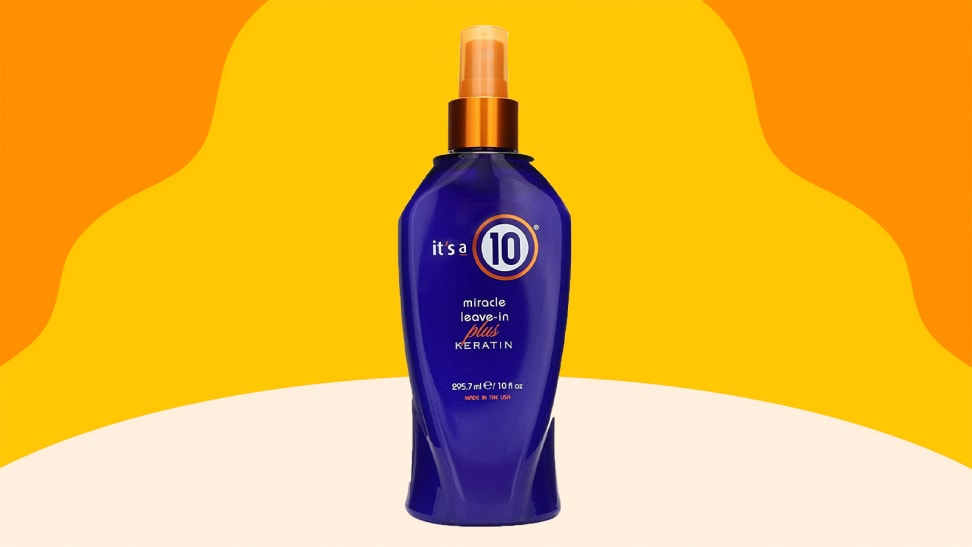 The bottle of It's A 10 Miracle Leave-In Plus Keratin on an orange, yellow, and cream background.