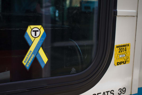 A shot of a sticker on a local MBTA bus.