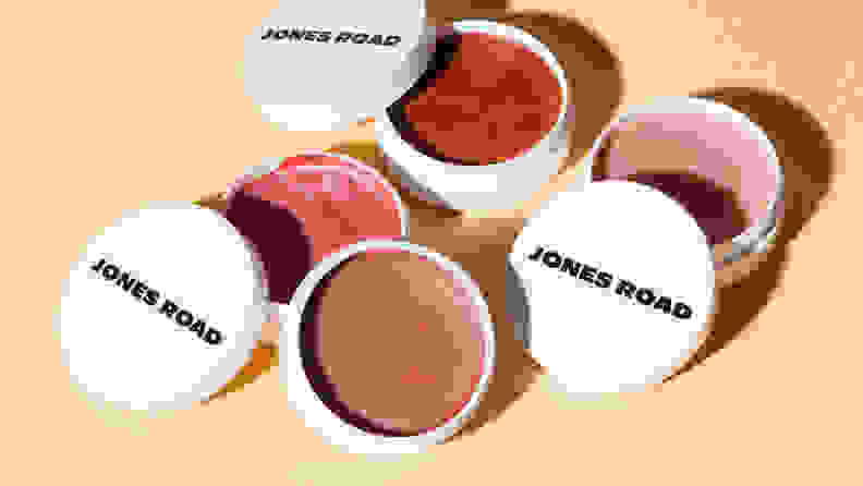 Different shades of compacts skin balms.