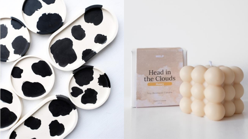 Left: cow print decorative trays, Right: a neutral textured cube candle sitting next to the box