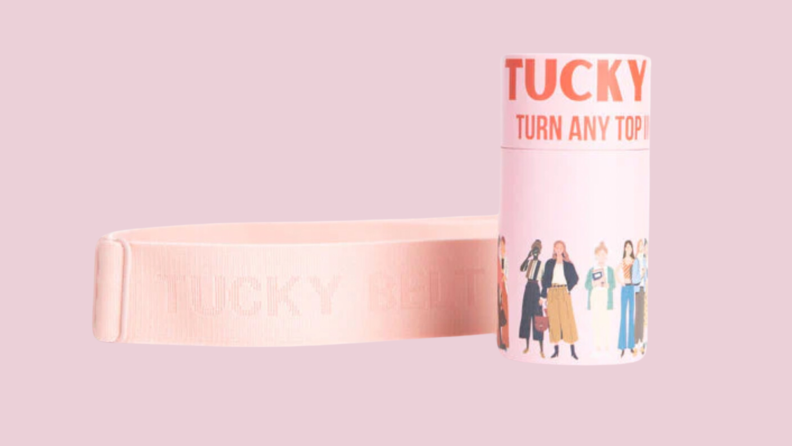 The Original Tucky belt next to a Tucky cylinder package