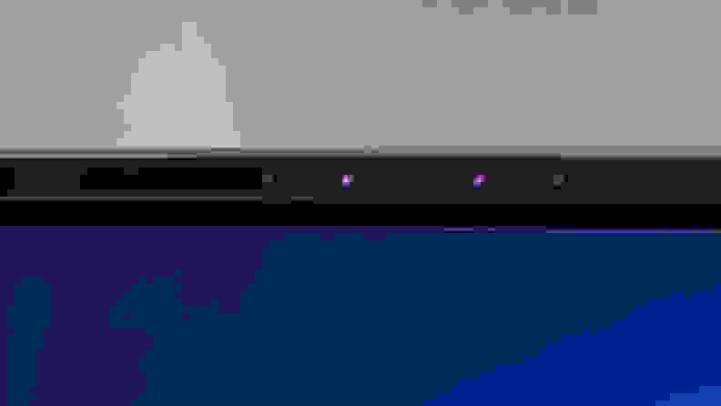 The top of a monitor with two purple lights