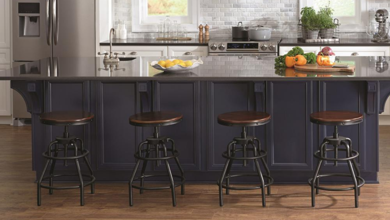 Four industrial stools