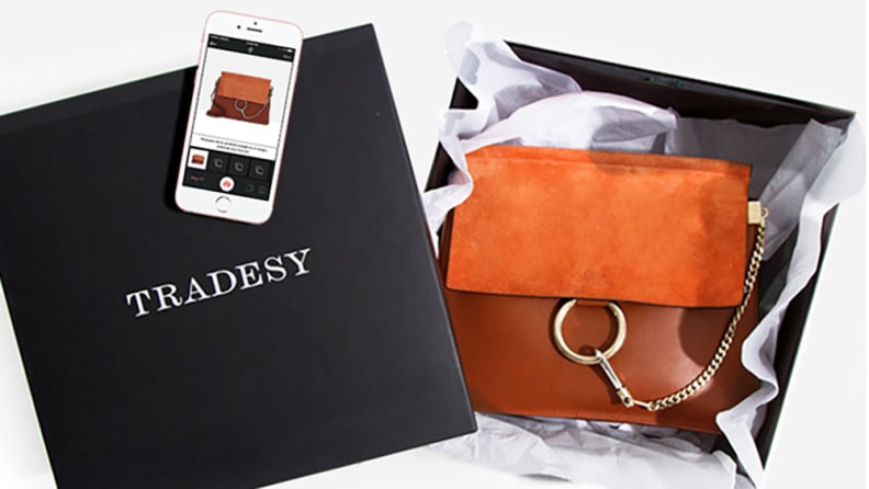 Tradsey box with brown purse in it.