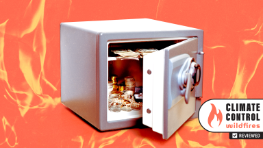 An open safe with money in it sits on a fiery orange illustrated background