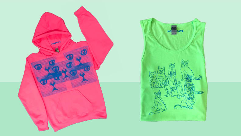A pink hoodie and green tank top with cats on them