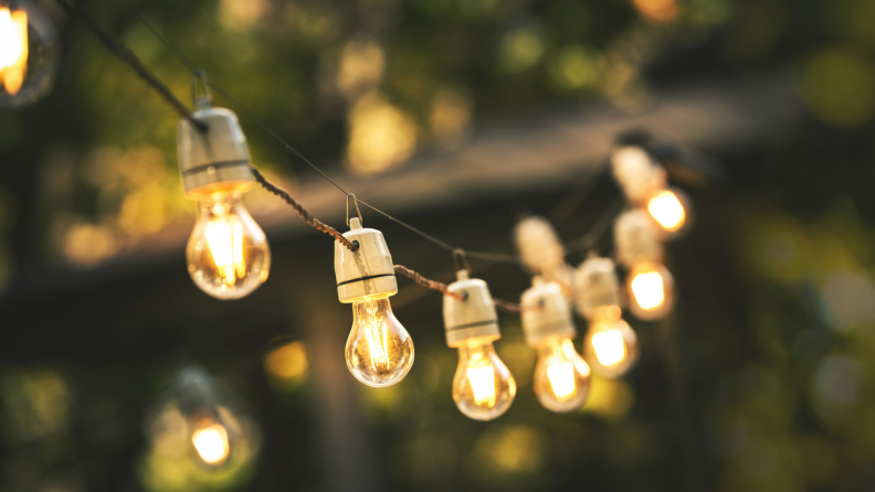 String lights hang outside.