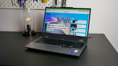 The Lenovo LOQ with the Reviewed homepage displayed on it.