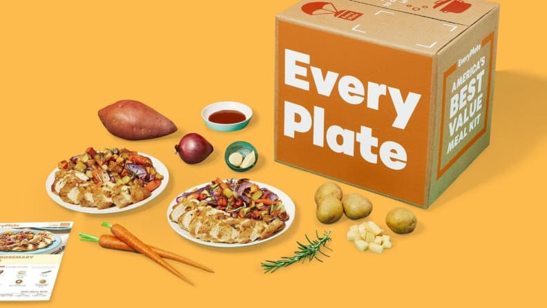 EveryPlate box with ingredients and menu cards in front