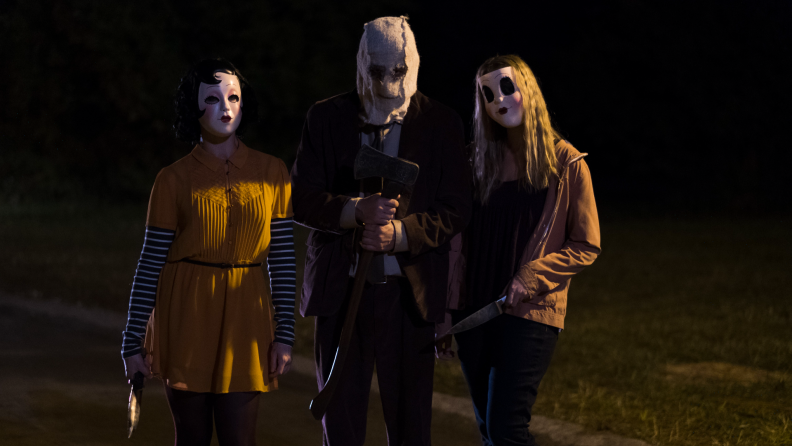 Damian Maffei, Emma Bellomy, and Lea Enslin play the masked killers in ‘Prey at Night.’