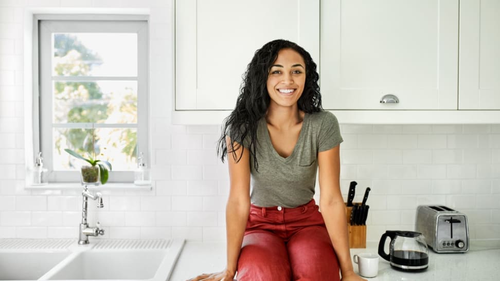 Woman in renovated kitchen