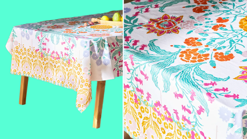 Product shot of multi-colored, printed tablecloth on top of table.