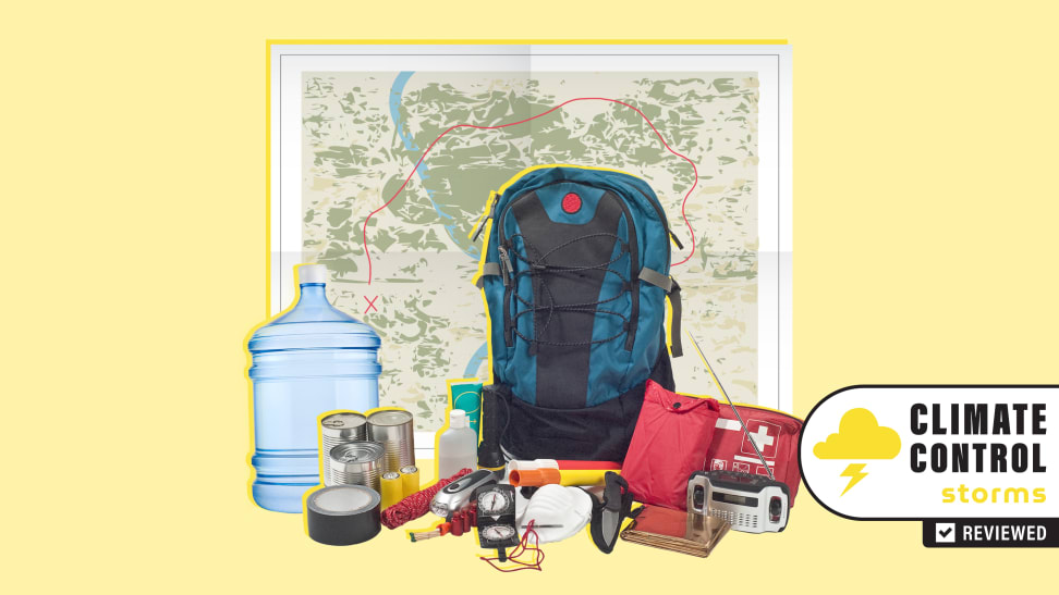 Emergency preparedness items like a backpack, a first aid kit, a radio with antenna, a jug of fresh water, masks, tins cans of food, a geographic map and a flashlight.