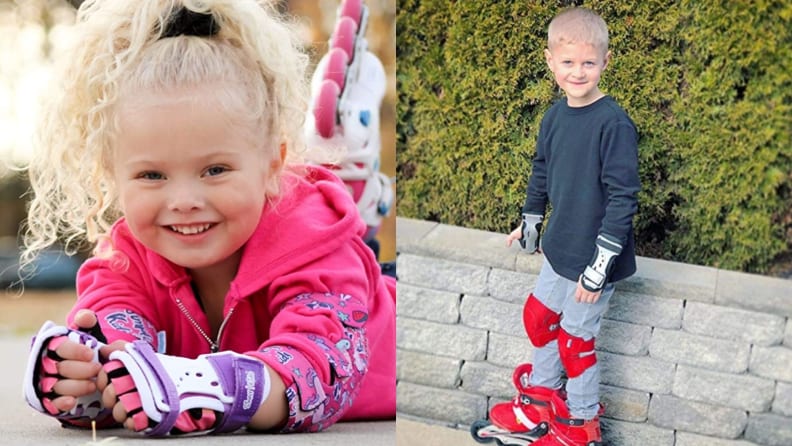 A girl smiles with her wrist guards. A boy stands looking happy.