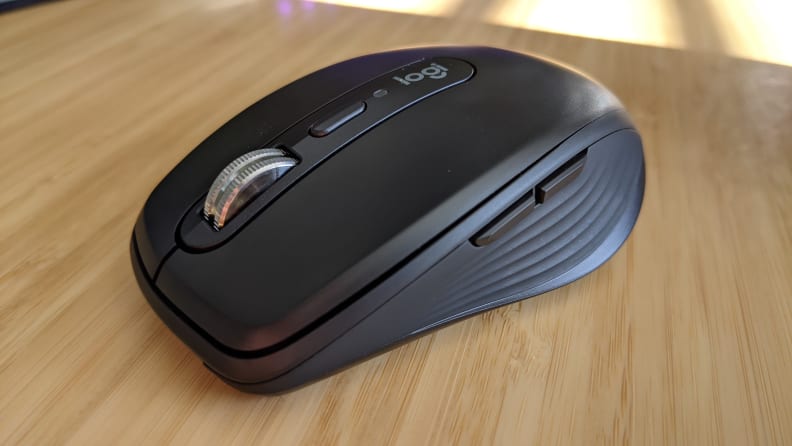 A computer mouse on top of a desk