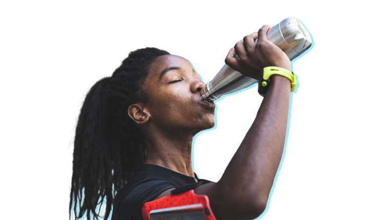 Person drinking from silver reusable water bottle with head tilted back