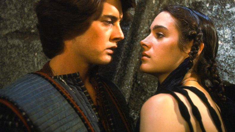 A frame from the 1984 version of Dune features Kyle MacLachlan (left) and Sean Young (right).