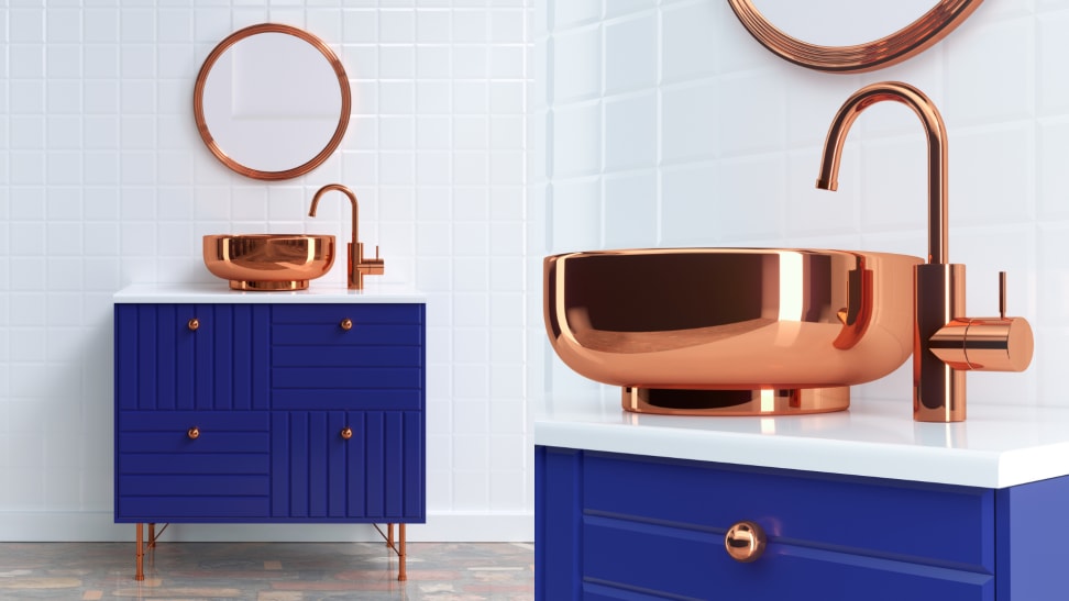 A clean minimalist bathroom with white tile, a blue cabinet and copper sink and mirror.