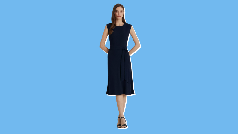 A black dress from Lauren Ralph Lauren against a blue background.
