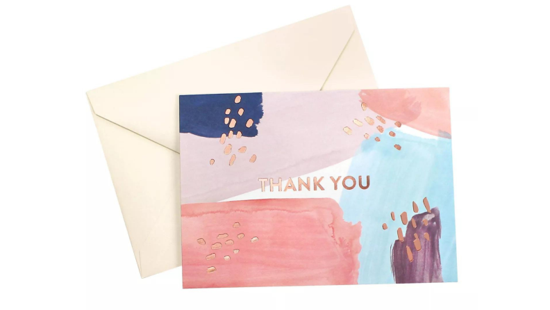 A colorful thank you card with brushstroke and golden flecks.