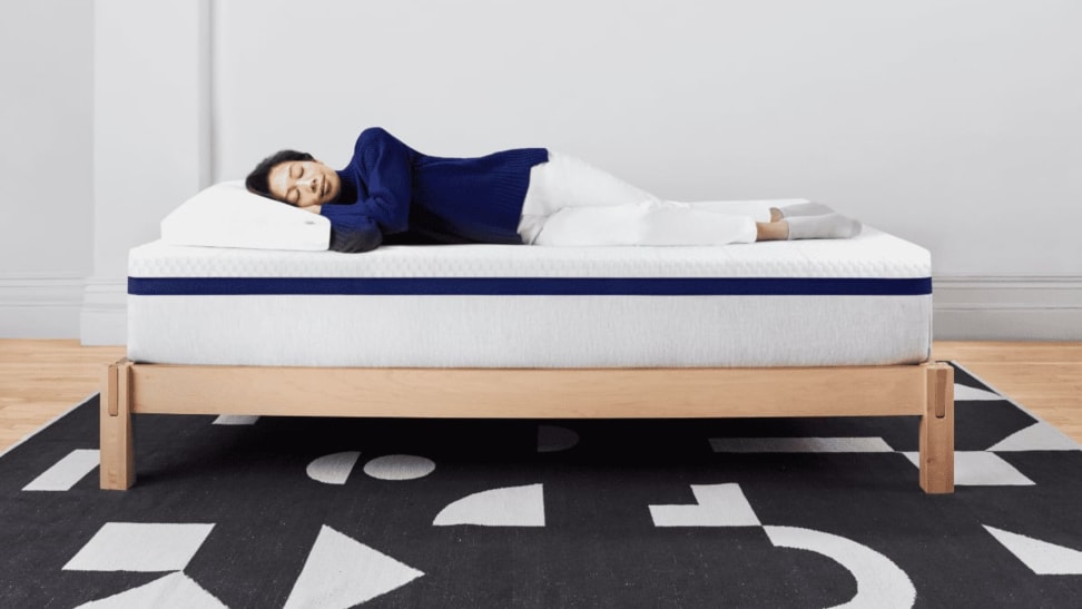 A woman sleeping on a Helix mattress.