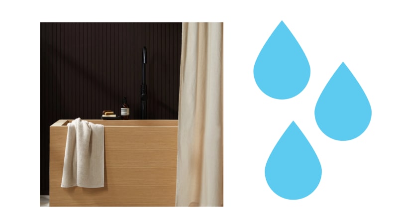 A beige shower curtain in a bathroom