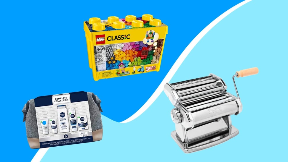 Children's toy, pasta maker, and skin care gift set in front of blue background.