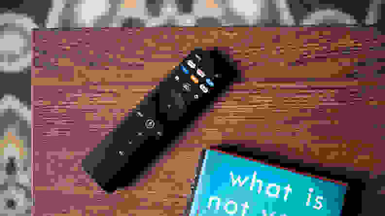 The 2022 Vizio remote control, placed on a coffee table