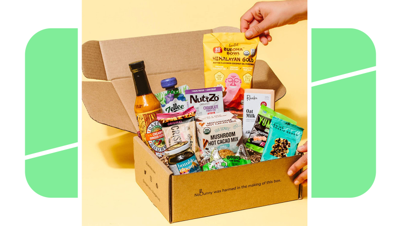 A subscription box of Vegancuts products on a yellow background.