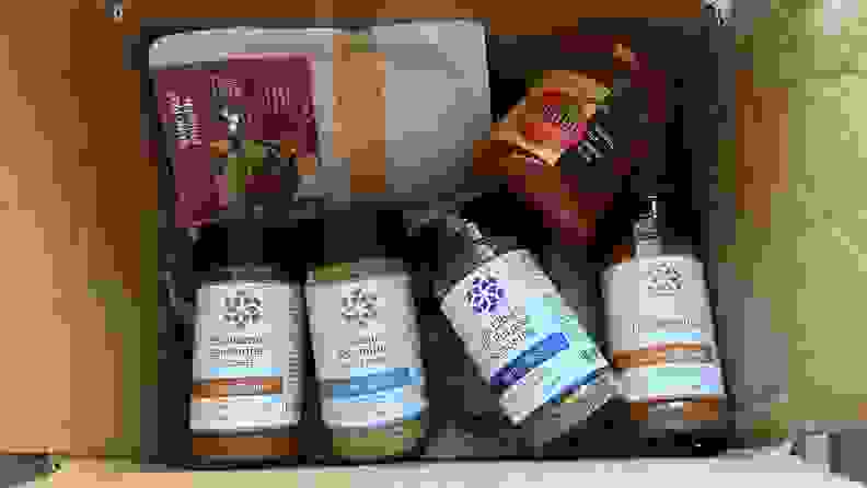 A box filled with Savory Spice's products.