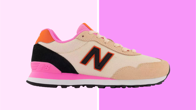 An image of a New Balance sneaker in tan, black, and hot pink.