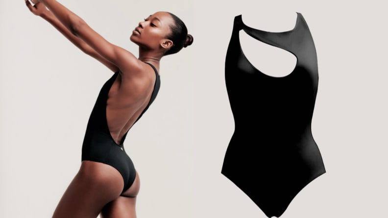 Model displaying black keyhole one-piece swimsuit.