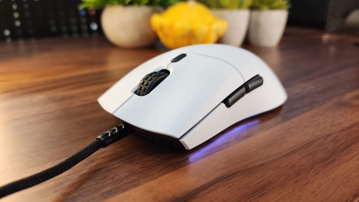 A close-up angle shot of the NZXT Lift gaming mouse.