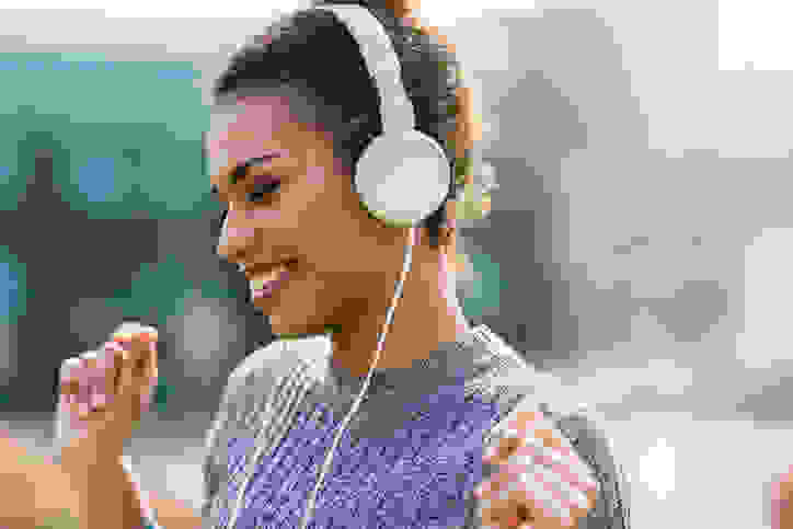 Woman listening to headphones