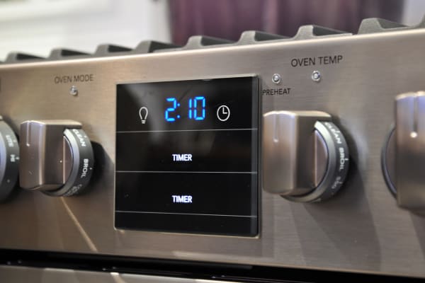 The Professional series oven includes a helpful front display, and chunky control dials.