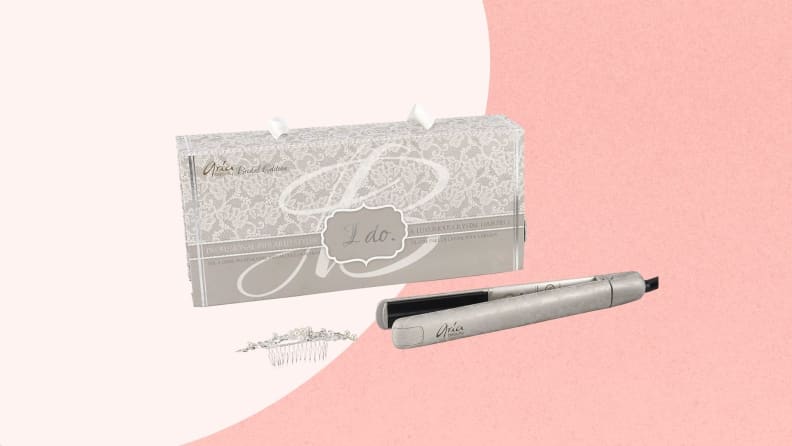 silver Aria straightener with Silver box and hair piece
