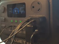 Closeup shot of the Bluetti Elite 300 with multiple chargers plugged into different ports