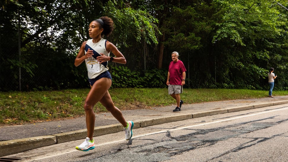 A person running on a street.